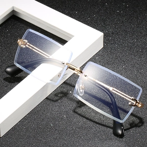 Classic square blue light blocking glasses with gold metal temples and clear lenses