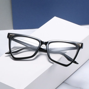 Classic black cat-eye anti-blue light glasses with golden metal triangle accents