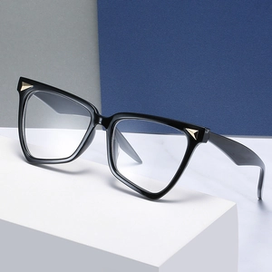 Cat eye blue light blocking glasses with black frame and golden metal triangle rivets