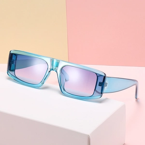 Trendy rectangular sunglasses with translucent blue frames and purple gradient lenses