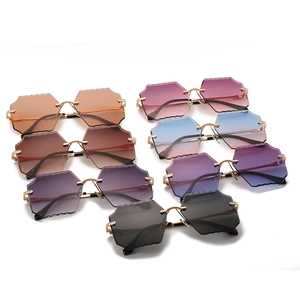 Frameless geometric sunglasses in various gradient ocean colors with stylish cut edges