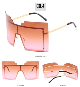 Vue sous trois angles de lunettes de soleil masque avec verres dégradés orange et rose