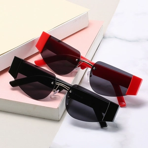 Modische randlose quadratische Sonnenbrille mit scharfen geometrischen Gläsern in Rot und Schwarz
