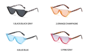 Détail de quatre lunettes de soleil carrées surdimensionnées en diverses couleurs tendance
