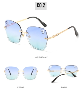 Three views of rimless gradient sunglasses with gold engraved temples and rhinestone detail