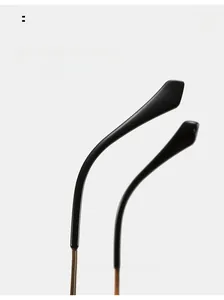 Detail of ergonomic curved sunglasses arms with premium black finish and metal core