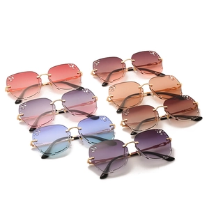 Fashion rimless square sunglasses with gradient lenses and rhinestone hollow design