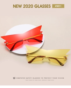 Detailed macro view of trendy oversized rimless sunglasses with UV400 and metallic temples