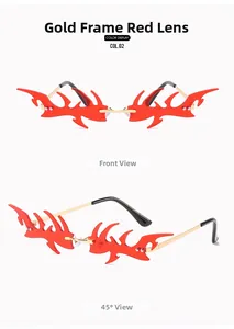 Detailed view of punk flame-shaped rimless sunglasses with gold frame and red lenses