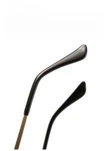 Detail of ergonomic black temples with gold metal wire for no-pressure comfort