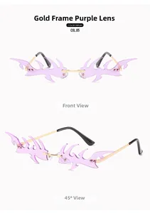 Detail view of gold frame purple fire shaped rimless punk sunglasses from side angles