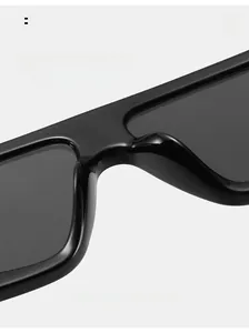 Detail of ergonomic smooth nose pads on black square rhinestone sunglasses