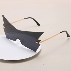 Modern oversized cat-eye sunglasses with gold metal temples and UV400 protection