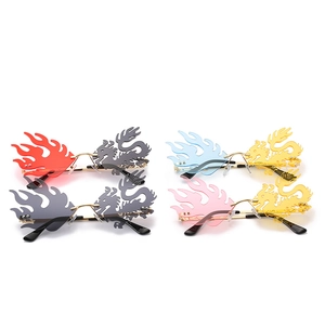 Edgy rimless sunglasses featuring unique flame and dragon wing shapes with metal temples