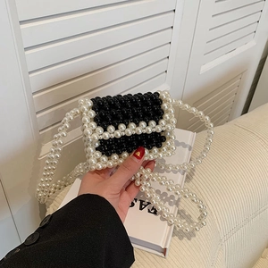 Handmade pearl mini crossbody bag with black and white checkerboard woven pattern