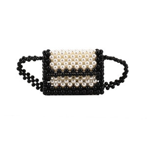 Handmade pearl mini handbag with black and white contrast stitching and retro woven beads