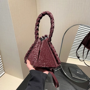 Minimalist burgundy snake skin triangle handbag with woven handle and shoulder strap