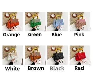 Grid view of contrast color box bags in eight colors with gold bridge handles and wavy texture