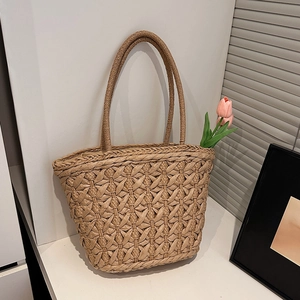 Handwoven floral straw tote bag for summer beach vacation with long shoulder straps