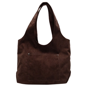 Brown corduroy tote bag for women featuring a functional front pocket with metal rivets