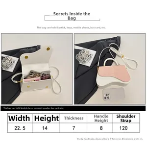 Size chart detail of a stylish contrast color box bag with adjustable shoulder strap