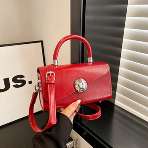 Chic red glossy box handbag with silver sphere clasp and top handle for women