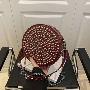Retro wine red round crossbody bag with silver rivets and metal chain strap for women