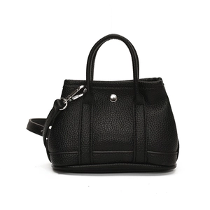 Mini black lychee pattern leather tote bag with silver snap button and crossbody strap