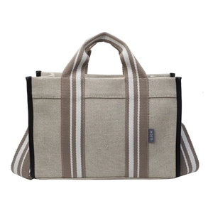 Chic beige canvas tote bag with brown striped handles and minimalist square design