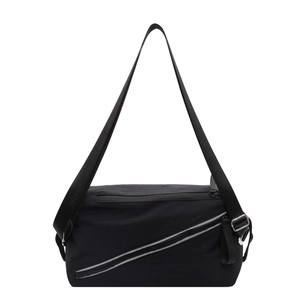 Versatile black canvas crossbody bag with adjustable shoulder strap and diagonal zipper