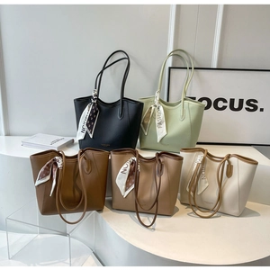 Litchi texture leather tote bags in five colors with stylish silk scarf handle detail