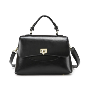 Glossy black trapezoidal handbag with elegant gold square buckle and top handle