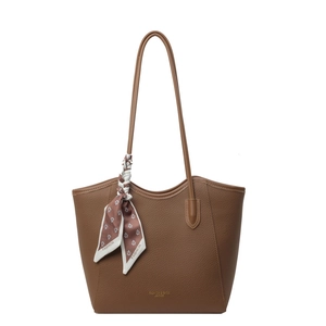 Elegant brown pebbled leather tote bag for women with a decorative floral scarf detail