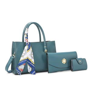 Deep teal lychee pattern tote bag with matching wallet and pearl detail charm