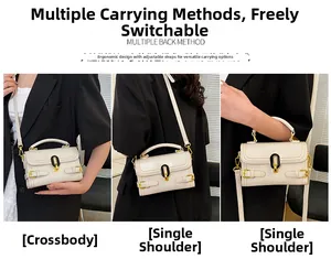 Close-up of white embossed stone pattern handbag with gold clasp and leather strap