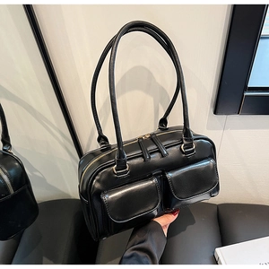 Retro black leather tote bag with double front pockets and gold hardware finish