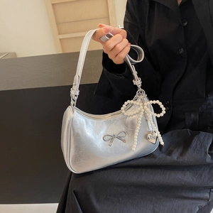Chic silver metallic hobo bag with bow detail and pearl charm pendant for women