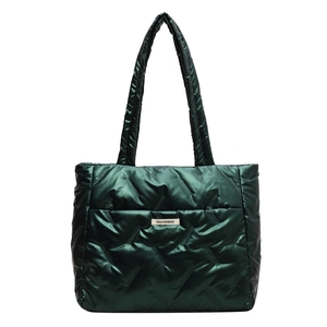 Dark green quilted puffer tote bag with glossy nylon finish and shoulder strap for women
