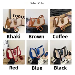 Detail view of large capacity canvas and faux leather shoulder bags in six color options