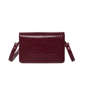 Vintage burgundy crossbody bag with glossy wrinkled leather and decorative stitching