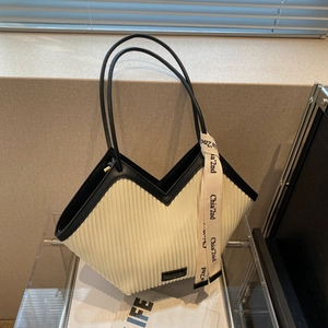 Sac fourre-tout à rayures verticales style français en tissu crème et bordures en cuir noir