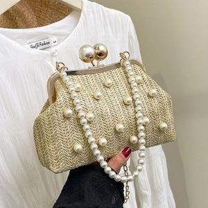 Fashion straw woven clutch with pearl beads and metal frame closure for summer styling