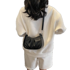 French style black pleated cloud crossbody bag for women with adjustable strap