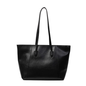 Large black minimalist PU leather tote bag with long straps for casual office commute