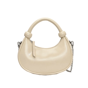 Retro beige leather crescent handbag with circular handle and silver chain strap