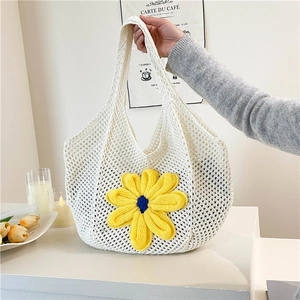 Floral woven tote bag with yellow sunflower design for summer beach or casual outings