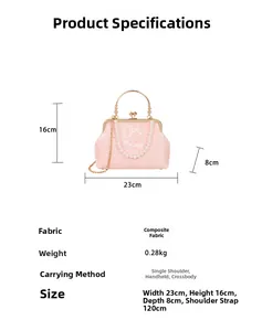 Detailed view of a pink floral clutch bag with pearl handle and metal chain dimensions