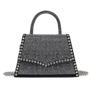 Sparkling rhinestone chain handbag with crystal handle and silver sphere strap in black