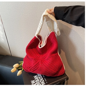 Handmade red and white crochet tote bag with hollow knit texture and integrated handle