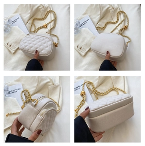 Detailed views of a white quilted crossbody bag with golden chain and adjustable ball slider